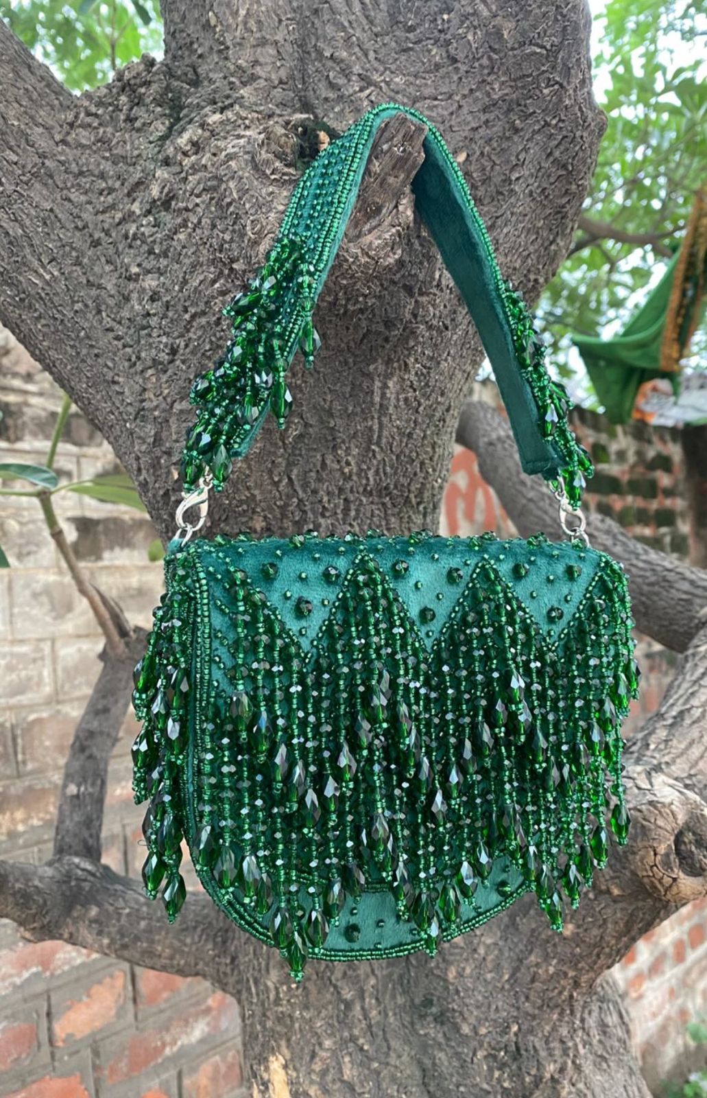 Emerald Cascade Fringe Clutch