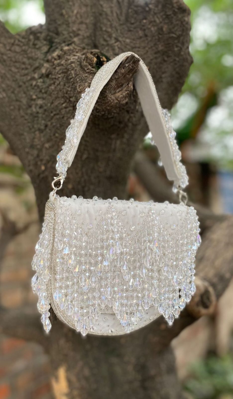 Emerald Cascade Fringe Clutch